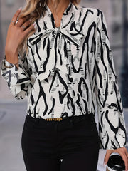 Abstract Stripe Print Long Sleeve Tie Neck Blouse