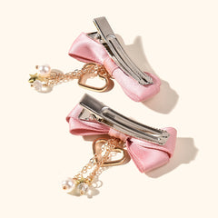 2pcs Girls Bowknot Hair Clips Stars & Hearts Pendant Hairpins