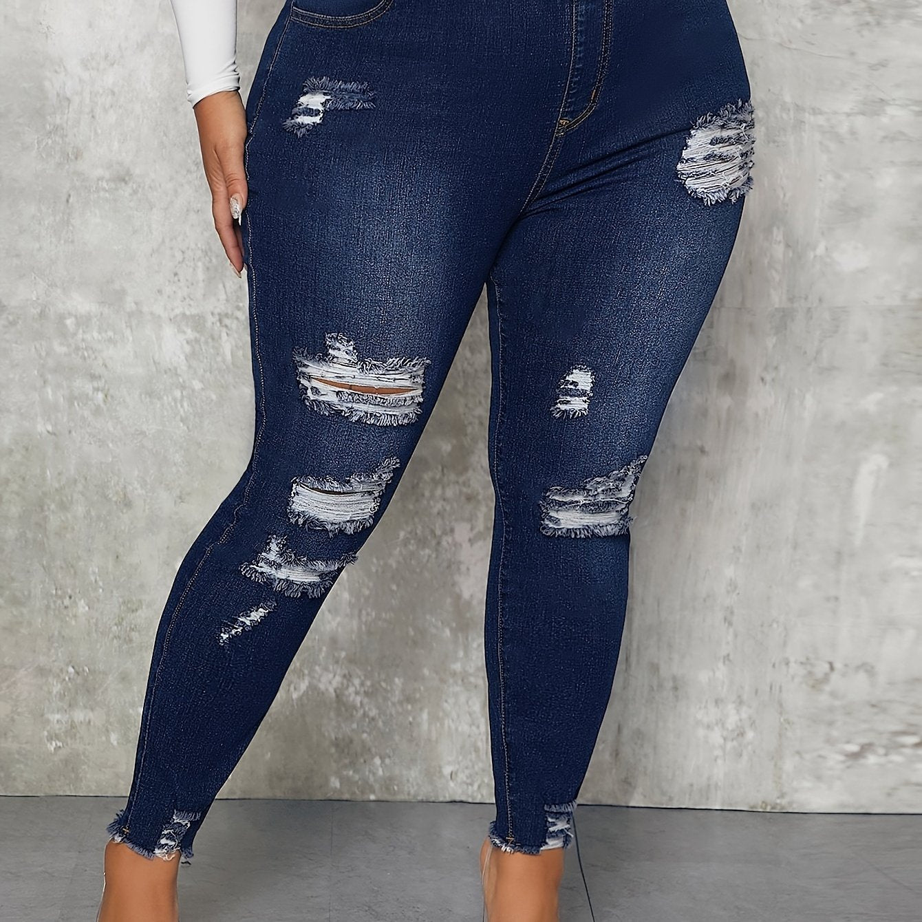Ripped Fringe Raw Trim Skinny Jeans