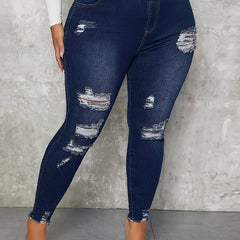 Ripped Fringe Raw Trim Skinny Jeans