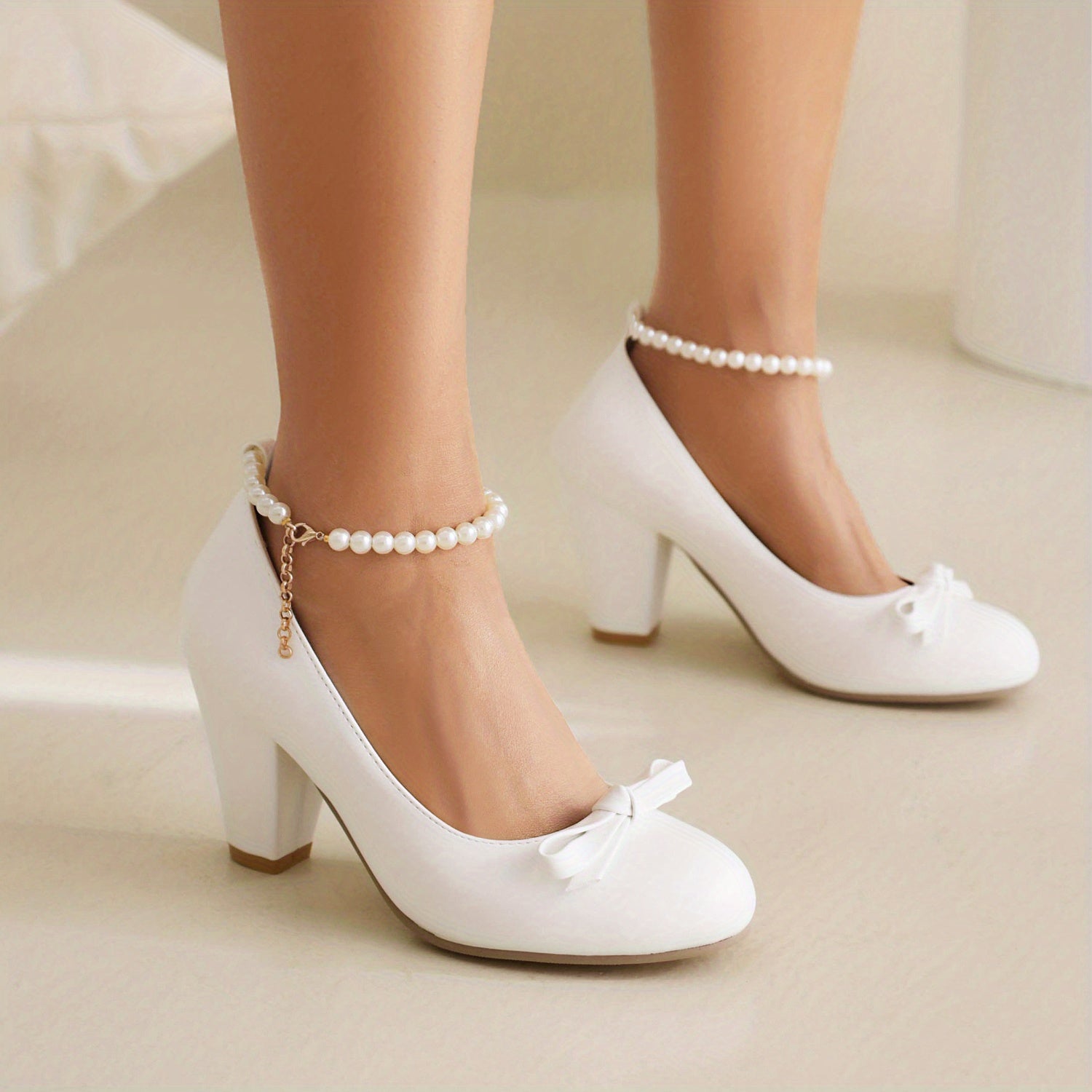 Bowknot Block Heel Pumps with Faux Pearl Chain