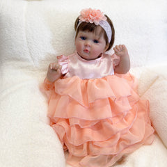 Adorable Reborn Baby Girl Doll with Peach Dress and Pink Hair Bow