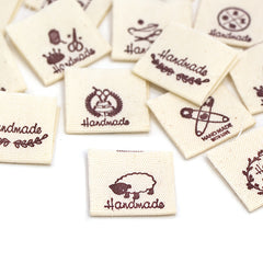 50pcs Cloth Label Folding Label Sheep Love Pattern Knitted Hat Stitched Label