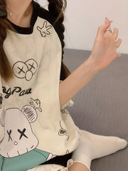 Cartoon Print Pajama Set Short Sleeve Crew Neck Top & Ruffle Shorts