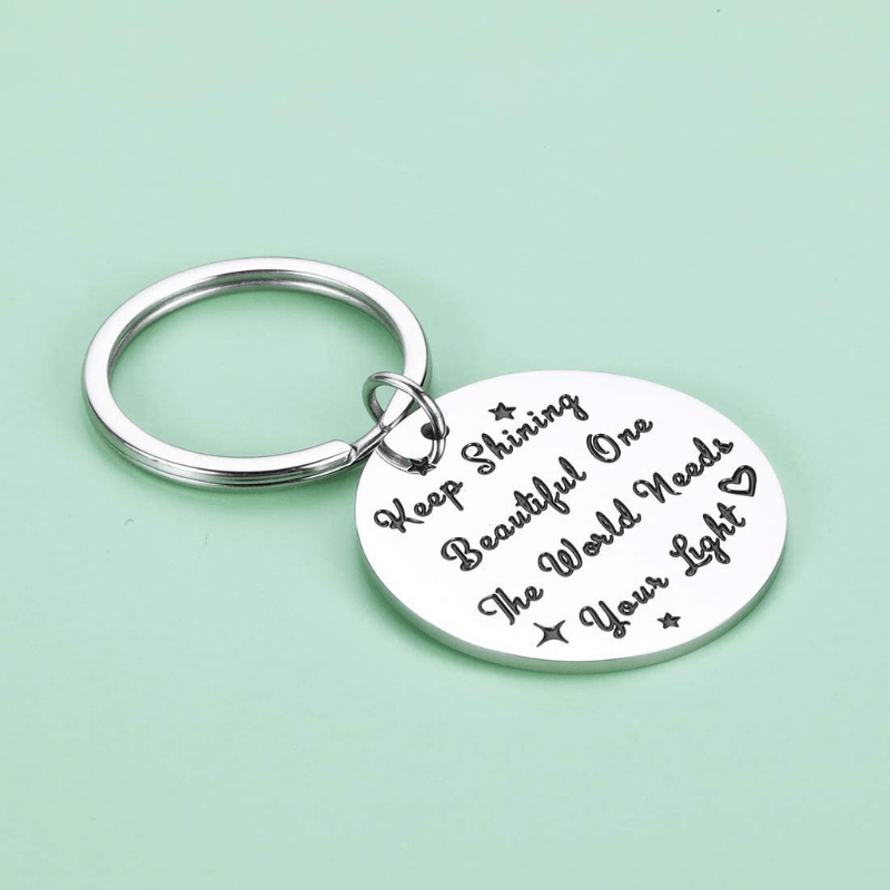 Spread Your Light Inspire World Keychain