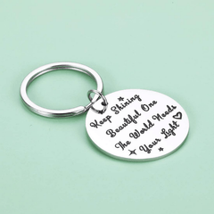 Spread Your Light Inspire World Keychain