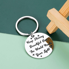 Spread Your Light Inspire World Keychain