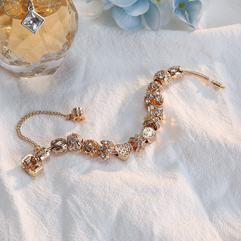 Women's Happy Face Gold Bracelet with Heart Pendant