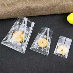 100pcs Snowflake Christmas Plastic Candy Cookie Dessert Packaging Bag