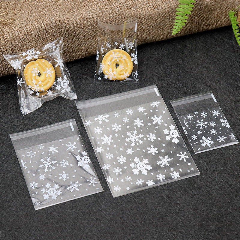 100pcs Snowflake Christmas Plastic Candy Cookie Dessert Packaging Bag