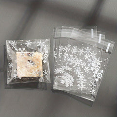 100pcs Snowflake Christmas Plastic Candy Cookie Dessert Packaging Bag
