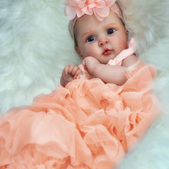 Adorable Reborn Baby Girl Doll with Peach Dress and Pink Hair Bow