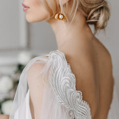 Elegant Lace Wedding Gown with Flowing Train