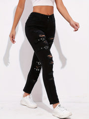 Ripped Skinny Jeans with Grommet Buckle Detail