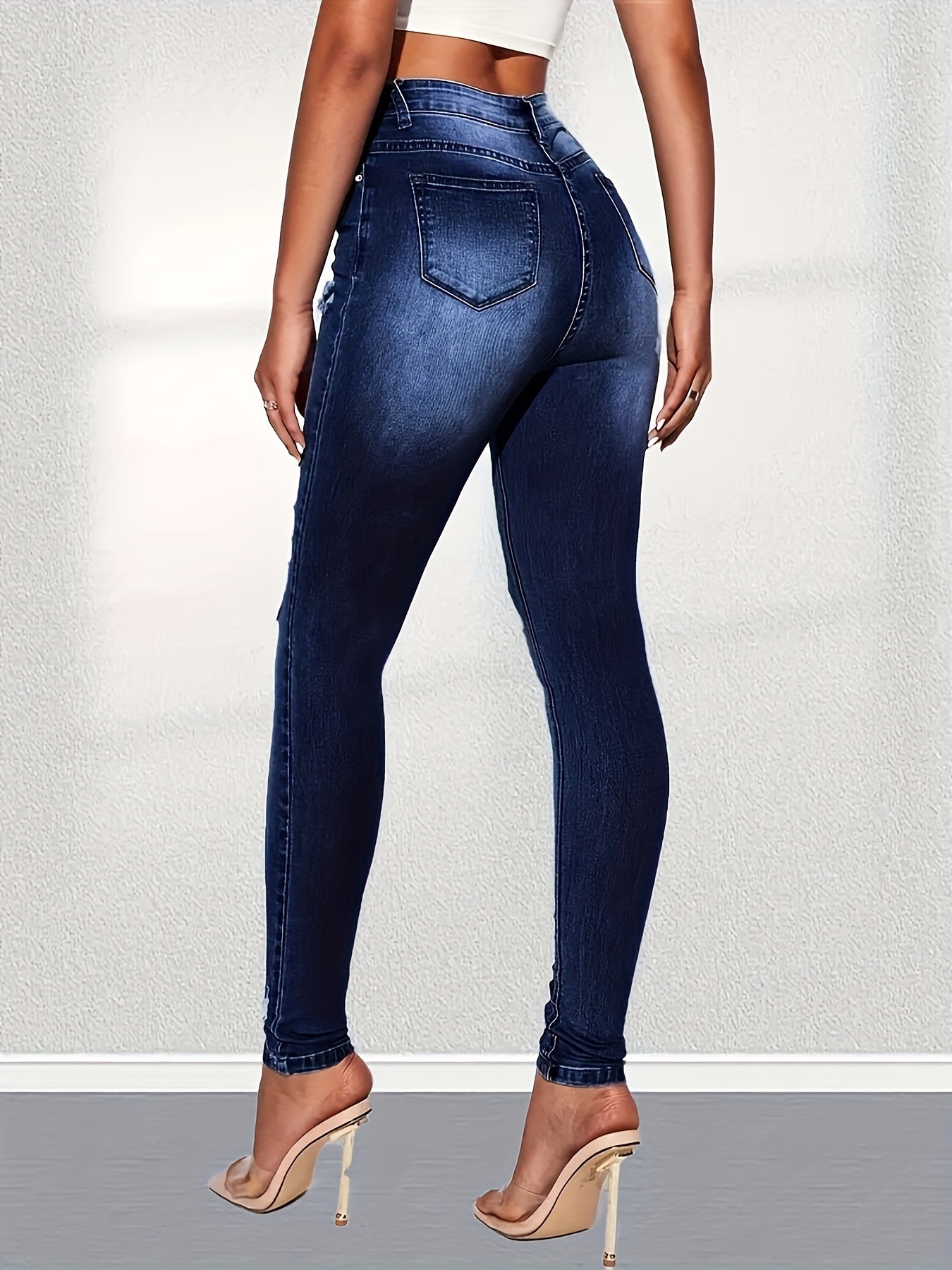 Ripped High Rise Skinny Jeans