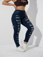 High Stretch Skinny Jeans with Ripped Fringe Trim