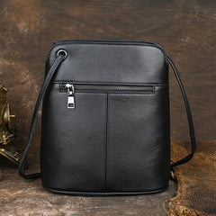 Floral Embossed Leather Crossbody Bucket Bag with Tassel