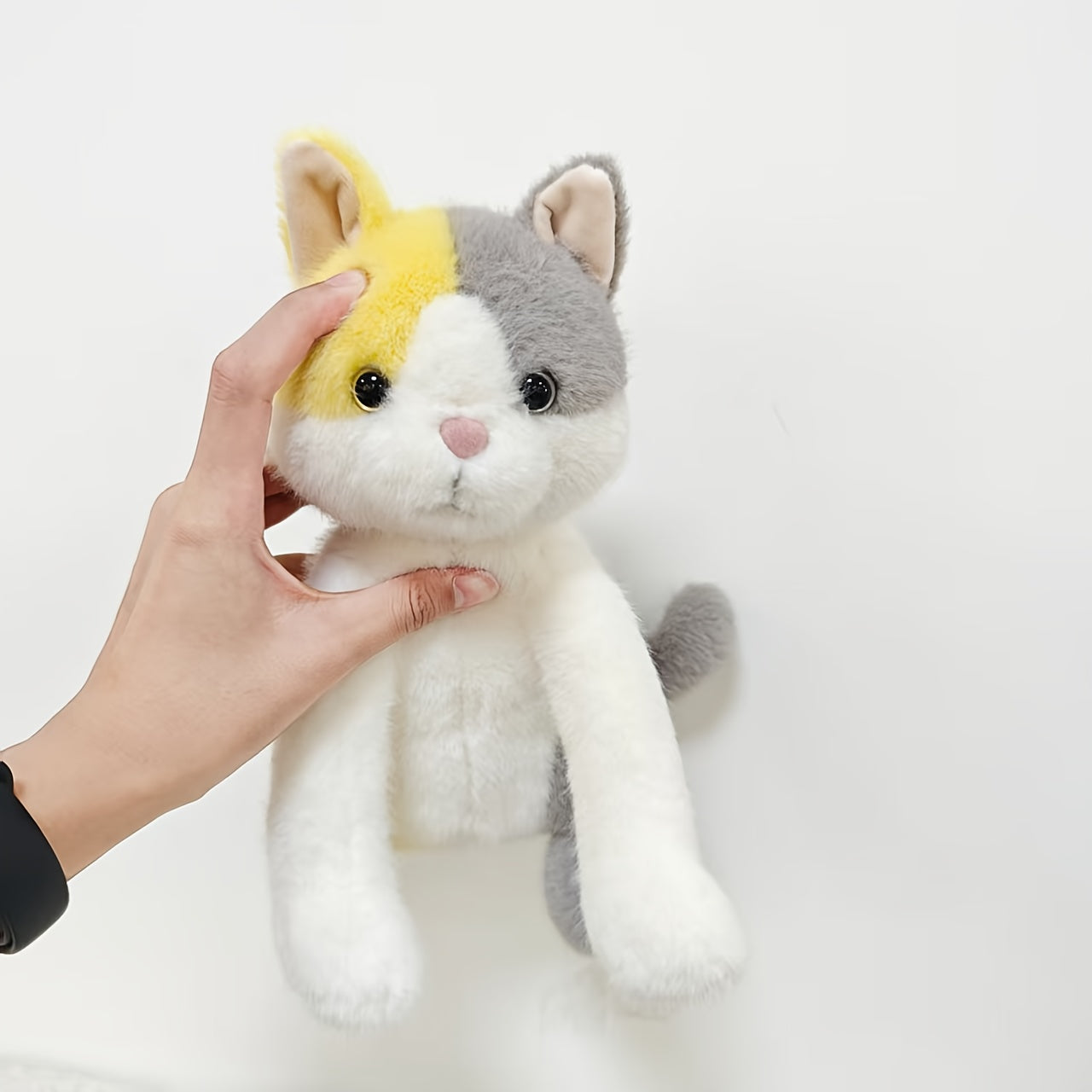 Fluffy Grey and Yellow Plush Cat Toy with Expressive Eyes