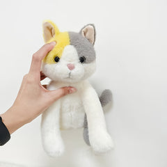 Fluffy Grey and Yellow Plush Cat Toy with Expressive Eyes