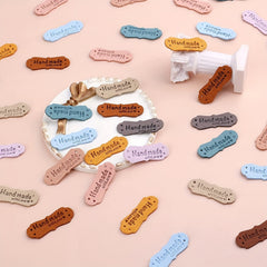 50pcs 10 Colors Leather Labels Microfiber Embossed Crochet Labels