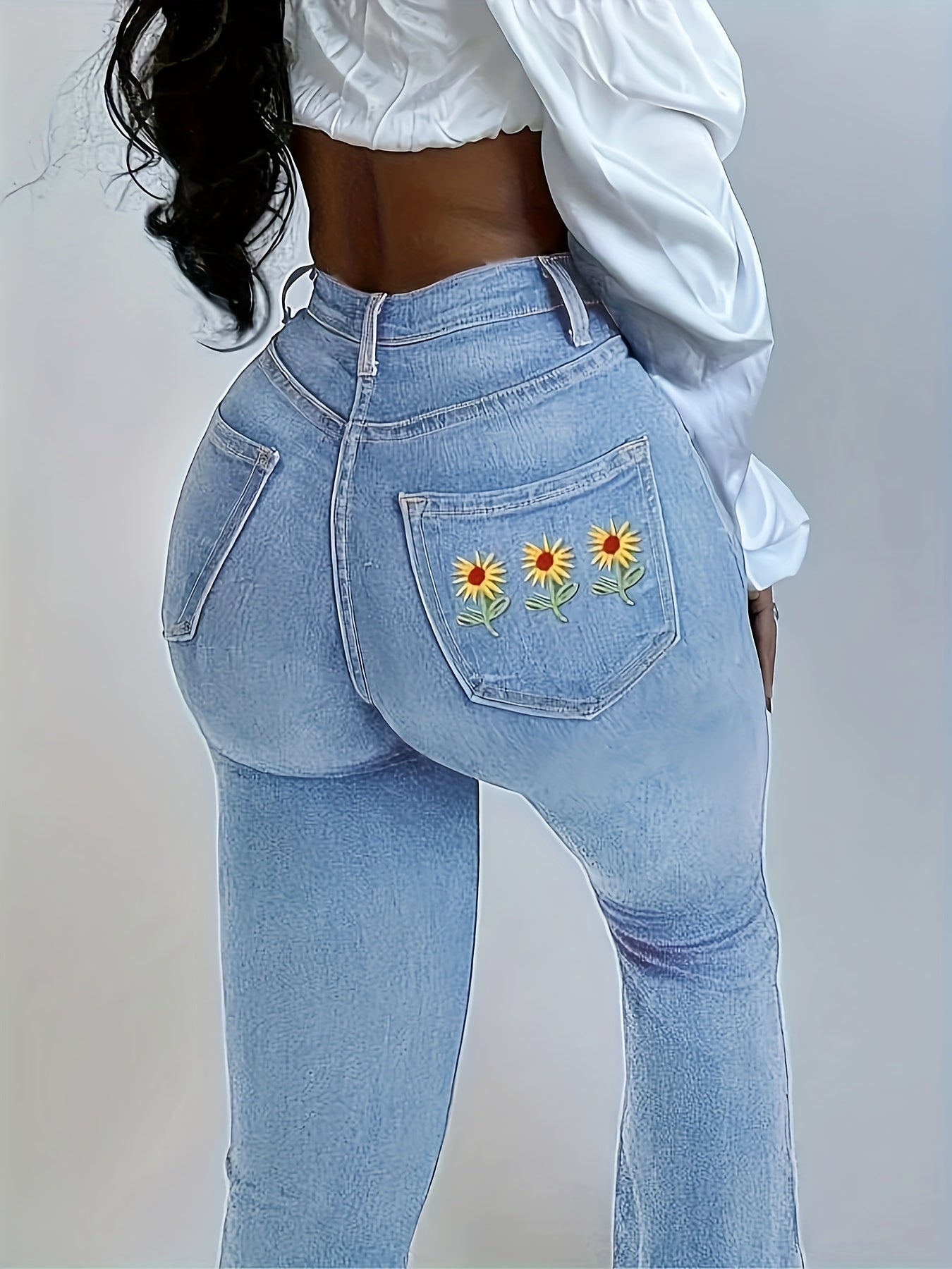 Floral Print High Rise Flared Leg Jeans