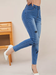 High Rise Button Fly Skinny Jeans