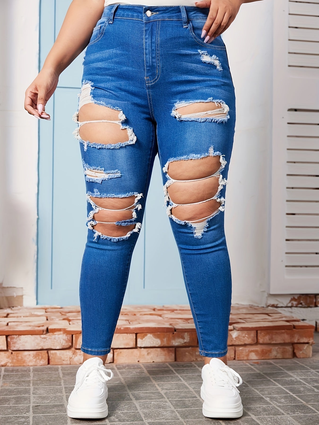 Cut Out Ripped Skinny Jeans