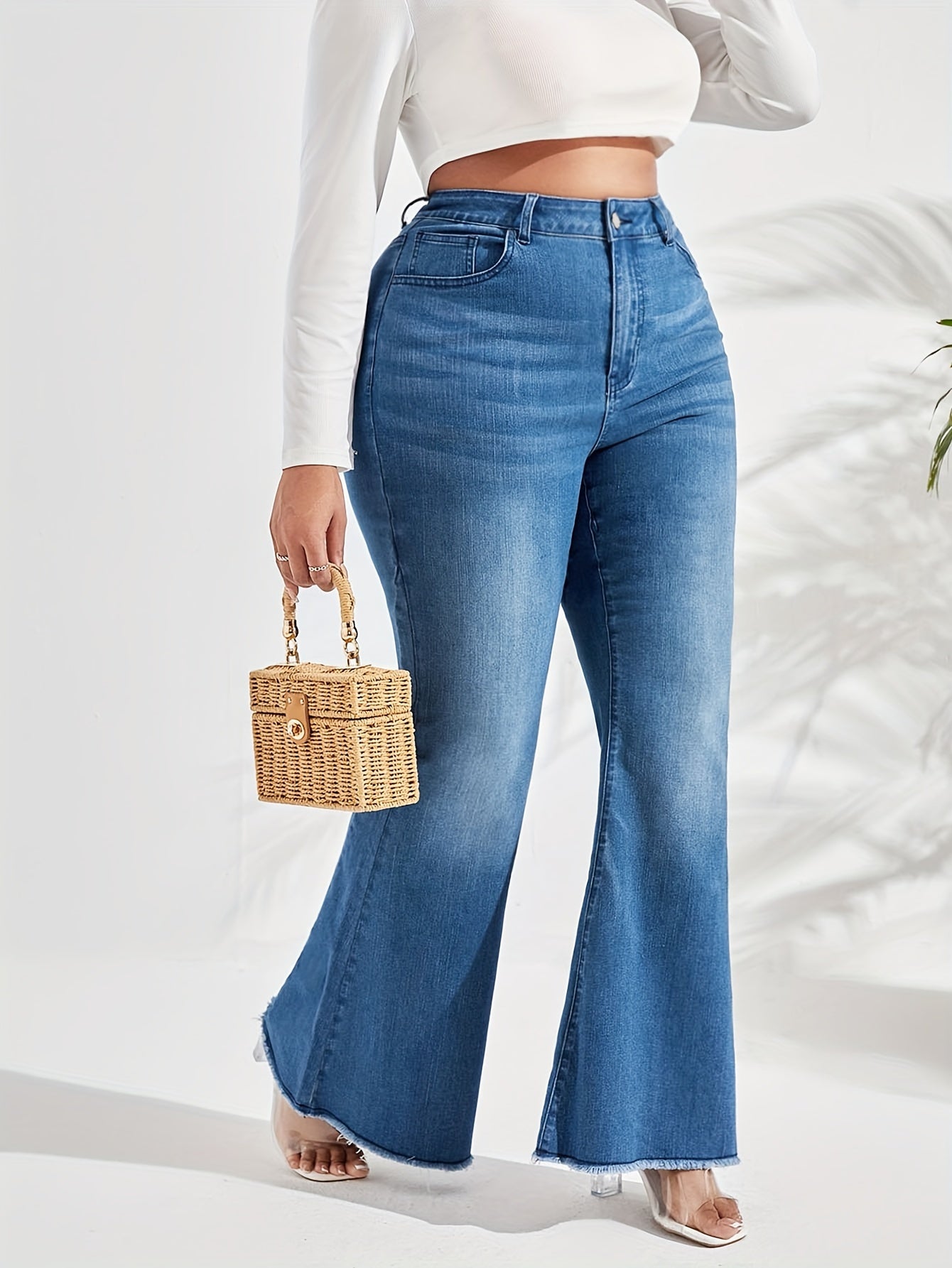 Washed Button Fly Flared Leg Jeans with Fringe Trim