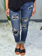 Ripped Floral Button Up Skinny Jeans