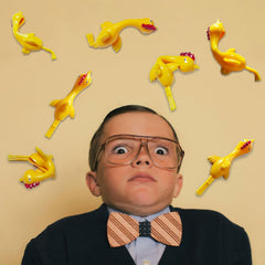 Bulk Yellow TPU Flying Rubber Chicken Finger Slingshot Toys
