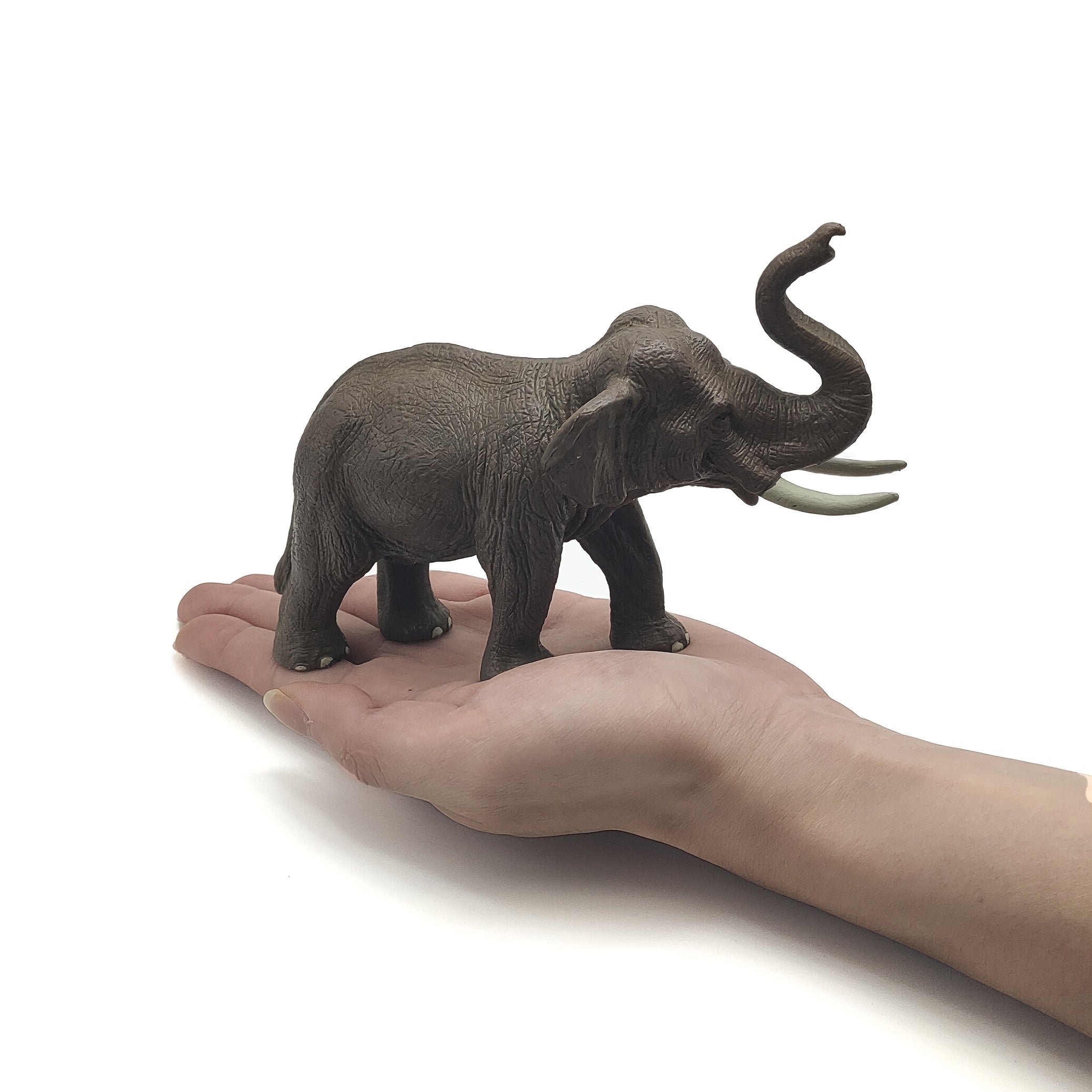 PVC Elephant Statue w/ Green Leaves - Home Decor & Collectible Display