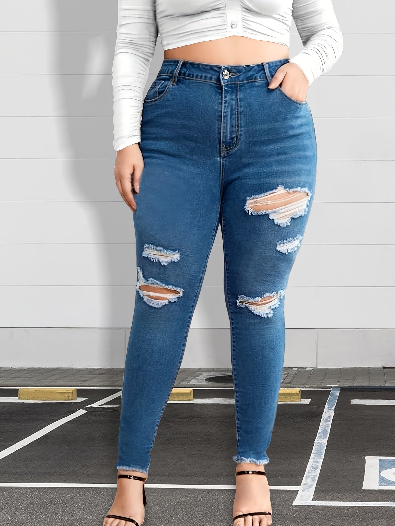 Ripped High Rise Skinny Jeans