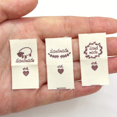 50pcs Cloth Label Folding Label Sheep Love Pattern Knitted Hat Stitched Label