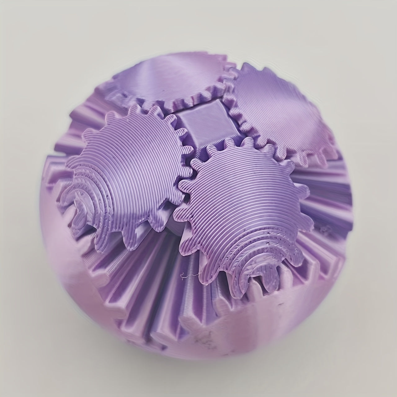 3D Printed Multicolor Gradient Gear Ball Spinning Sphere Stress Relief Model