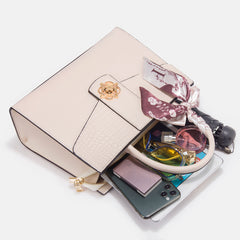 Chic Two-Layer Leather Handbag with Tassel Elements