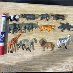 12 Animal Figurines: Lion, Tiger, Giraffe, Zebra, Bear, Elephant, Rhino