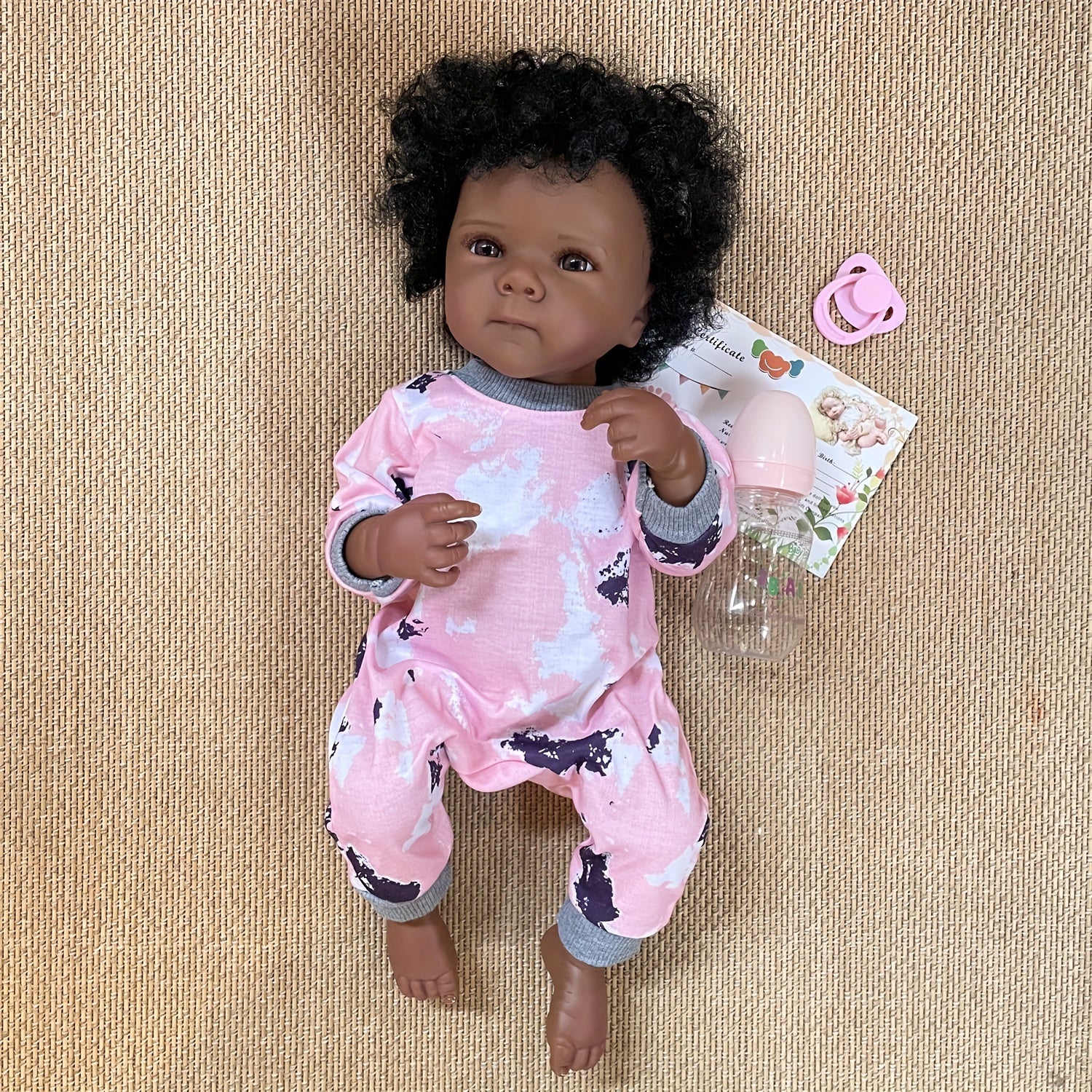 Dark Skin Bettie Vinyl Baby Girl Doll with Rooted Hair Brown Eyes