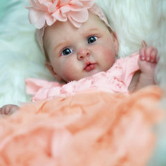 Adorable Reborn Baby Girl Doll with Peach Dress and Pink Hair Bow