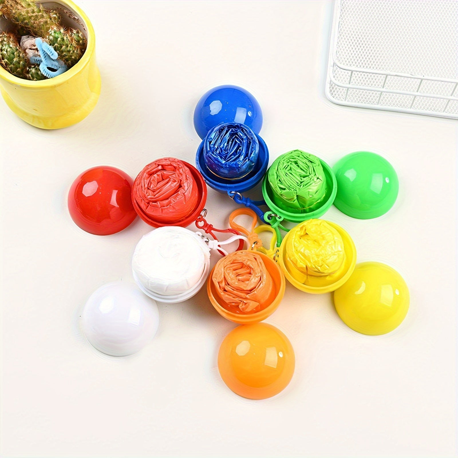 Disposable Raincoat Ball - Compact & Portable Rain Jacket in a Ball