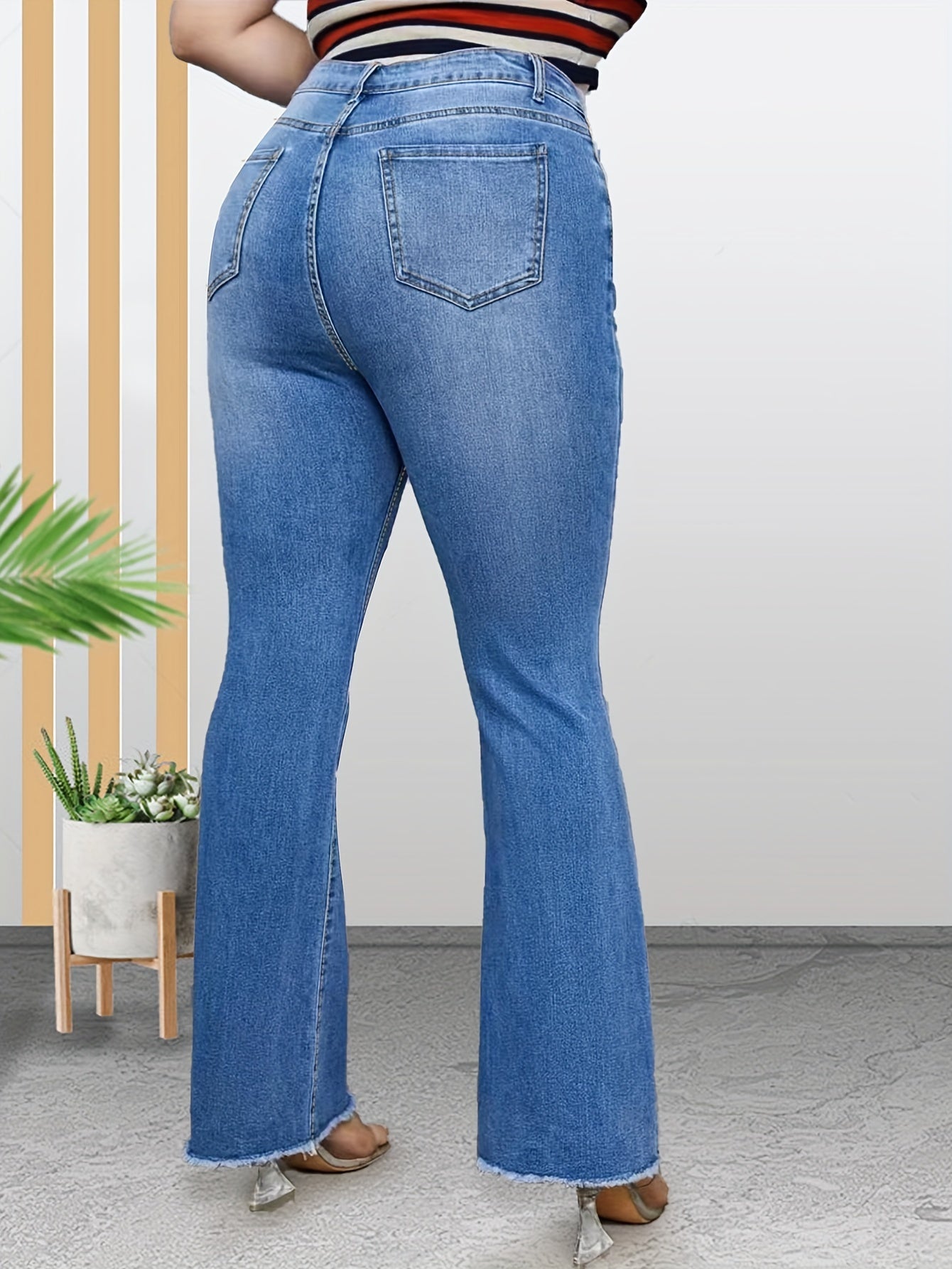 High Rise Flared Leg Jeans with Fringe Trim