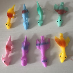 Mini Dinosaur Finger Slingshot Toys - Colorful Prank Fun for Classmates