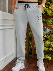 Men's Smiling Face Graphic Drawstring Sweatpants for Exercise