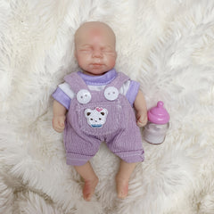 6 Inch Silicone Girl Doll in Purple Overalls with Unicorn Patch