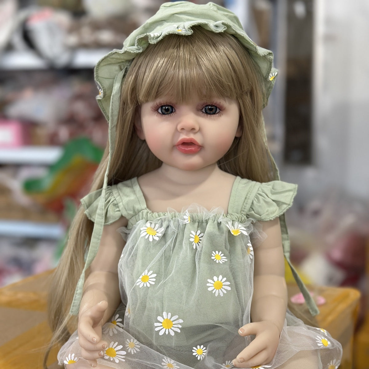 22 Inch Reborn Doll with Long Blond Hair Green Daisy Outfit Sandals