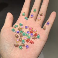 100pcs Glow in the Dark Mini Turtle Toys Multicolor Nail Art Charms