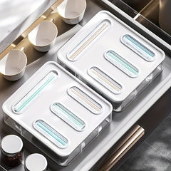 Bag Storage Organizer And Wrap Dispenser With Cutter For Kitchen Drawer