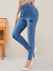High Rise Button Fly Skinny Jeans