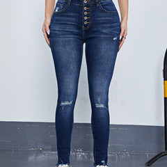 Ripped High Rise Skinny Jeans with Fringe Trim