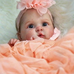 Adorable Reborn Baby Girl Doll with Peach Dress and Pink Hair Bow