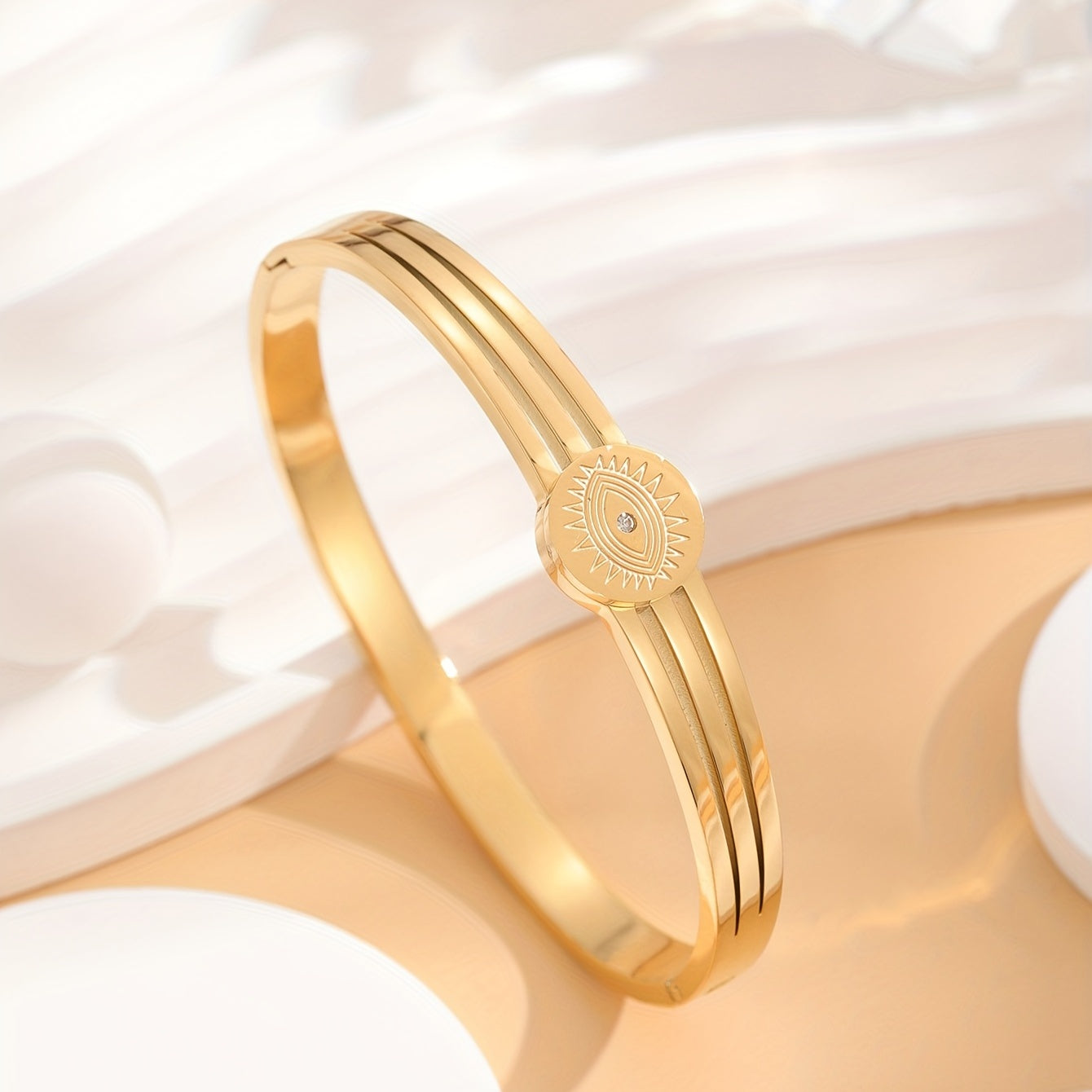 Golden Stainless Steel Bracelets with Rhinestone Eye Pattern